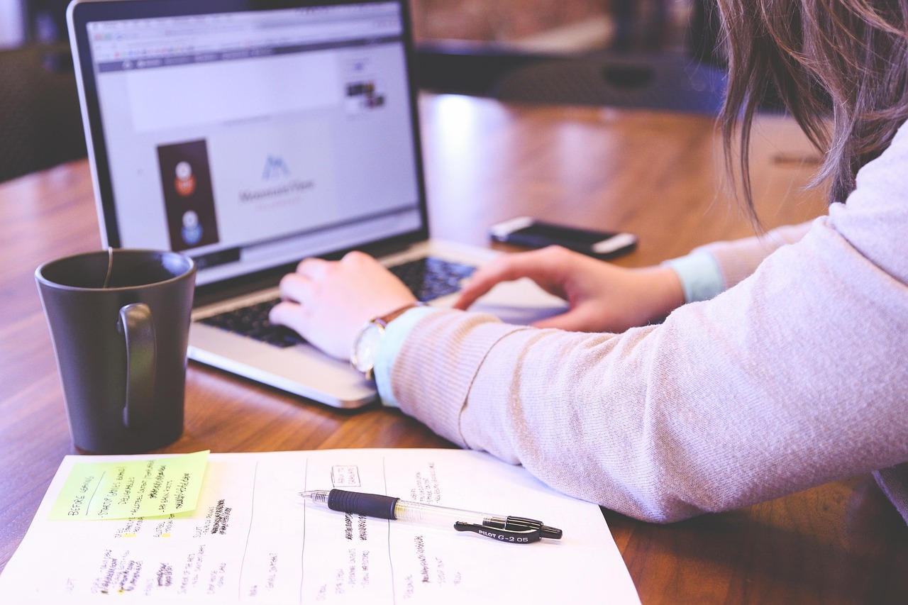 Student, typing, keyboard — How Take Profit Trader Provides Capital to Scale Your Trading Strategy