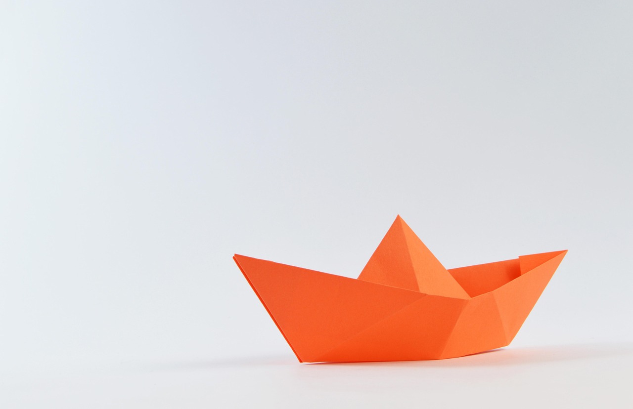 Origami, paper, candle — Sailing The Seven Seas What To Expect On A Grand Cruise Tour