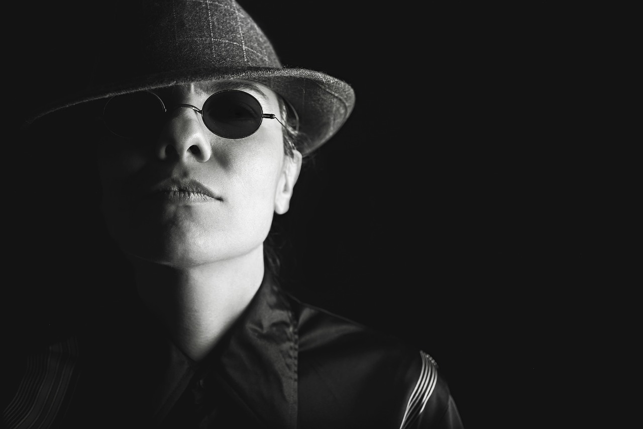 Man, hat, glasses — Understanding the Benefits of a Free Background Check in Michigan