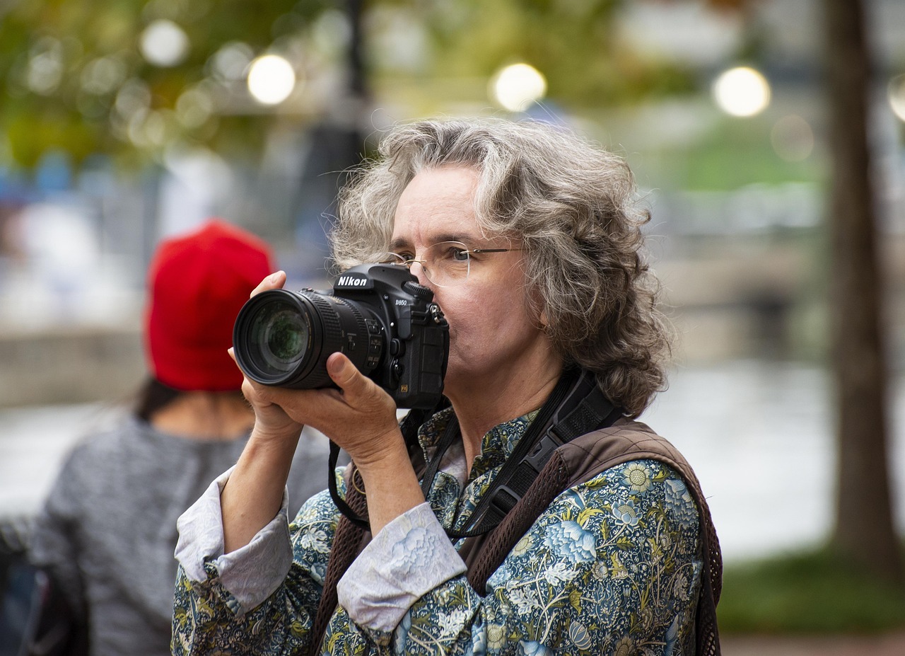 Camera, photographer, woman — Unleashing the Potential: AI's Role in Transforming Mobile Technology