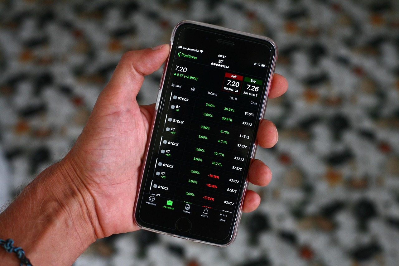Iphone, stocks, market — Virtual Cryptocurrency Exchange Development And The Growth Of Digital Assets